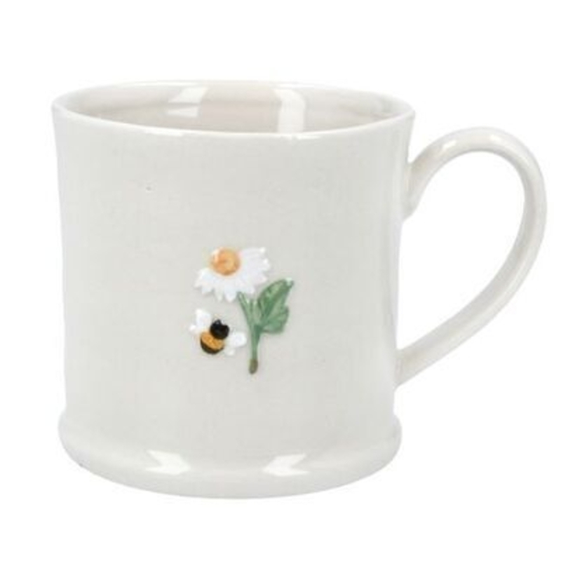 Stoneware mini mug with embossed bee and daisy design. A lovely addition to your home for Spring and the perfect gift for Mothers day. By Gisela Graham.